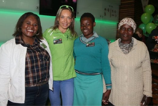 Irvette van Zyl crosses the finish line to win the Spar Women's 10km Challenge. (Photo by Reg Caldecott).